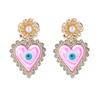 Pendientes europeos y americanos de venta caliente, frescos y lindos en forma de corazón para los ojos, exagerados para mujer, de aleación con aceite goteado, diamantes, perlas, lote de aretes