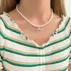 Collar de perlas de doble capa estilo retro francés para mujer, ligero, lujoso, de alta gama, con cadena para el cuello.
