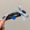 Presilha de cabelo com laço doce estilo coreano, grampo elegante para penteados presos, presilha de cabelo fofa e versátil para mulheres, acessório de cabelo de alta qualidade