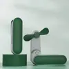 2026 Nuevo Modelo Multifuncional Portátil de Mano Mini Ventilador Carga USB Estudiante Exterior Plegable Almacenamiento Mini Ventilador