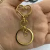 Suministro directo de fábrica Hebilla de estrella 8 chapado en color Accesorios de joyería DIY Gancho de aleación en forma de estrella de cinco puntas Llavero