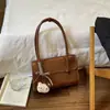 Moderna y a la moda 2026 nueva colección de bolsos de nicho para mujer: Bolsos de axila estilo coreano de gran capacidad, adecuados para ir al trabajo y para el uso diario