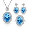 Transmisión en Vivo Más Vendido Conjunto de Joyas de Piedras Preciosas Rojas y Azules Color Huevo de Paloma, Popular Collar de Cristal de Lujo, Aretes y Anillo para Mujeres en Europa y América