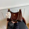 Bolso transfronterizo para mujer, nuevo estilo de otoño, bolso de hombro con cadena inspirado en Chanel, textura retro de moda, bolso de axila con bloques de color para mujer