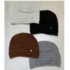26 Otoño/Invierno Etiqueta Metálica Uso Diario Gorro Tejido Color Sólido Simple Casual Versátil Dobladillo Plegado Headwrap Sombrero para Clima Frío