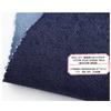 Tela de mezclilla imitación algodón brocado hilo elástico mezclado tarjeta 354GSM tela para pantalones vaqueros casuales de pierna ancha para mujer