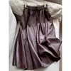 Otoño 2026 Nuevo Estilo Vintage Trendy Falda de Longitud Media de Cuero Proteico, Cintura Elástica que Reduce la Edad, Venta al por Mayor H15CQ6129