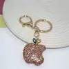 Venta al por mayor del fabricante Llavero de Manzana de Arcilla Blanda con Diamantes, Lindo Colgante Personalizado para Bolso, Llavero de Coche, Accesorios Coloridos