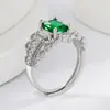 Anel de Zircônia Cor Esmeralda Mais Vendido para Mulheres em E-commerce Transfronteiriço, Moda Europeia e Americana, Elegante, Versátil e Brilhante Anel de Diamante