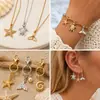 Accesorios para joyería DIY chapado en cobre oro real 18k serie oceánica colgantes pequeños delfín estrella de mar tortuga pulsera collar colgante