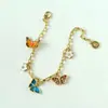 Serie de Jardín Billskinner Esmalte de Gama Alta Collar Pulsera de Corona Colorida Set de Mariposas Pintado a Mano