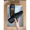 Zapatos de salón de punta cuadrada de fondo plano versátiles 2026 para mujer, suela blanda, estilo francés, tira cruzada, corte bajo, zapatos de ballet, cuero suave, estilo nuevo
