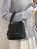 Bolso tipo cubo único y elegante para mujer, nueva versión coreana primavera 2026, bolso de hombro simple, bolso cruzado casual de moda