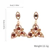 Pendientes de aguja plateada con borla hueca floral circular tachonada de diamantes, pendientes de estilo corte vintage, sensación de lujo ligero y alta gama