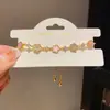 Placa de Acetato Pingente de Flor de Zircônia Pulseira Ajustável Europeia e Americana Elegante Elegante Pulseira Luxo Acessível Joia de Mão de Alto Padrão para Mulheres