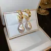 Pendientes de Perla de Circonita de Moda de Aguja Plateada Pendientes de Botón Retro de Lujo Ligero de Nicho Francés Pendientes Nuevos 2026