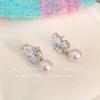 Pendientes de mariposa de cristal azul degradado populares de primavera y verano, diseño de nicho de aguja de plata S925, nuevos pendientes de explosión 2024