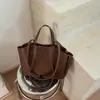 Bolso de mano retro de moda transfronterizo para mujer, nuevo y elegante bolso tote tipo cubo, bolso de hombro y cruzado de nicho