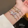 Pulseira Aberta Asa de Borboleta Dupla Camada com Zircônia Cúbica Estilo Coreano para Mulheres Elegante Versátil para o Dia a Dia Joia de Mão com Toque de Luxo Leve Venda por Atacado