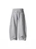 Calça Jogger Casual Xadrez Patchwork Estampada de Estrelas com Cordão para Homens e Mulheres, Nova Calça de Caimento Solto Emagrecedora Comprida