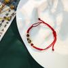 Nuevo colgante de calabaza Yuan Bao de cuerda roja tejida a mano estilo chino Joyería Nuevo Cuerda de mano ajustable de la suerte para hombres y mujeres