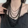 Colar de Corrente de Bolas Escuro Multi-Camadas de Luxo Leve Design de Moda Feminina Colar Empilhado Design de Nicho Corrente da Clavícula