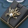 Cadena de suéter con perlas y hojas, directa de fábrica, para mujer, temperamento coreano, collar largo de perlas, accesorios de ropa para madres, venta al por mayor