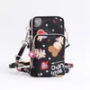 Bolsa diagonal para teléfono móvil al por mayor Nueva Bolsa pequeña para mujer Bolsa de tela para teléfono móvil bolsa vertical para cuello brazo muñeca monedero