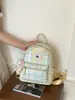 Mochila Feminina Estilo Menina Xadrez Fofo de Nicho 2026 Nova Tendência Moda Alta Aparência Pequena Bolsa Escolar para Estudantes