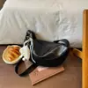 Bolso grande de mujer retro casual 2026 verano nuevo color liso bolsa de albóndiga simple para el trabajo hombro bandolera
