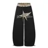 Estilo callejero americano estampado de leopardo cintura de felpa bordado de estrella de cinco puntas letra pantalones de chándal de pierna ancha unisex sueltos casuales pantalones largos modernos