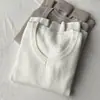 Suéter de punto para mujer con cuello en V, capa base para otoño/invierno 2025, suéter ajustado de manga larga con forro polar integrado, prenda superior engrosada y cálida