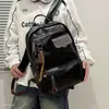 Mochila de viaje versátil de gran capacidad, estilo casual, nueva, para hombres y mujeres, con bolsillos, adecuada para ir al trabajo, mochila funcional 2026
