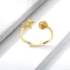 Anillo de Diseño Creativo Estilo Resort Francés Transfronterizo para Mujer Chapado en Oro Estrella de Mar Concha Incrustada con Circonita Anillo de Cola Ajustable