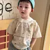 Camiseta de Manga Corta para Niños Ropa de Verano para Niños 2026 Nuevo Delgado Blanco con Letras Cuello Redondo Conjunto de Shorts de Mezclilla