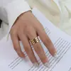 Anillo liso multicapa de doble capa con diseño de joyería europea y americana, anillo liso de acero de titanio y oro de 18 quilates para hombres y mujeres, anillo para parejas.