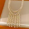 Collar de borlas multicapa con adornos de diamantes, cadena para clavícula de lujo ligero de nicho de alta gama, joyería de moda elegante estilo palacio para mujeres al por mayor