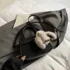 Bolso Pequeño Cuadrado de Lujo Ligero de Gama Alta Retro de Nicho de Moda para Mujer 2025 Nuevo Modelo Alta Estética Simple Casual Bolso de Hombro Cruzado