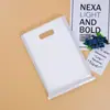 Bolsa de mano para ropa bolsa de regalo gruesa con remaches bolsa de cosméticos bolsa de embalaje con remaches hecha bolsa de plástico impresa con LOGOTIPO