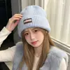 Gorro de punto estilo coreano con un pequeño patrón floral, hecho con tejido de mezcla de lana, diseñado para mujeres, adecuado para otoño e invierno, proporcionando calidez, grosor y protección para los oídos, y con un diseño moderno.