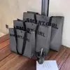 Tienda de Ropa Bolsas de Mano No Tejidas para Ropa de Mujer Empaque de Regalo Correas de Mano con Asa al Hombro Bolsas de Compras al por Mayor