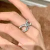 Anel Vintage de Luxo Leve com Desenho de Fogos de Artifício e Zircônia Cortada Design Feminino Anel de Dedo Cruzado de Luxo Leve Anel Ajustável