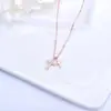 Colar Cruz de Prata Esterlina S925 Estilo Ins Guanming, Corrente para Clavícula Feminina com Pingente Pequeno Microcravejado, Moderno e Versátil