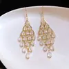 Pendientes de gota con incrustaciones de diamantes transfronterizos europeos y americanos, pendientes de lujo de alta gama, accesorios para orejas de moda de nicho, venta al por mayor desde fabricante de Yiwu