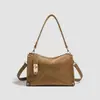 Nuevo bolso de bolos retro 2026 para mujer, bolso de hombro versátil para el trabajo, bolso tote elegante y moderno, y bolso de axila
