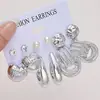 Nuevo Juego de Pendientes de Estilo Europeo y Americano con Rayas Trenzadas, Diseño Retro Geométrico, Sensación Simple y de Alta Gama, Juego de Pendientes de Botón de Nueve Piezas para Mujer