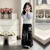 Conjunto de Dos Piezas de Moda para Niñas 2026: Sudadera de Manga Larga Estilo Universitario y Pantalones Casuales Anchos Sueltos