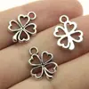 17x 13mm 0.6g comercio exterior AliExpress explosiones calientes flores y árboles pequeño hueco trébol de cuatro hojas colgante