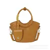 Bolsa de mão tipo balde de luxo para mulheres, nova bolsa de ombro com padrão trançado da moda, bolsa de mão vintage, bolsa transversal estilosa