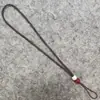 O fabricante direto Guan Shanyue oferece cordões de jade fumaça verde, pérolas, cordões de pérolas multicoloridos e outros acessórios para roupas tradicionais, leques, etc.